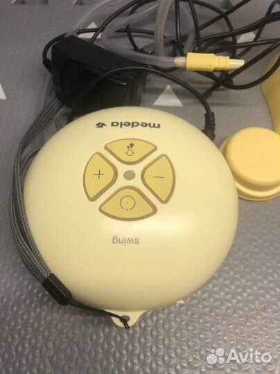 Молокоотсос medela электрический