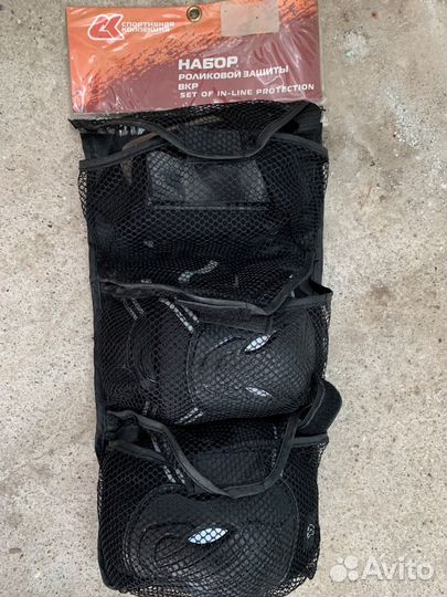 Роликовые коньки