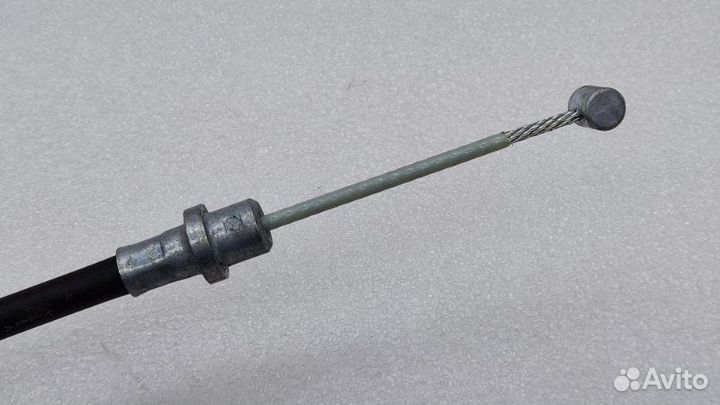 Трос стояночного тормоза левый Mitsubishi