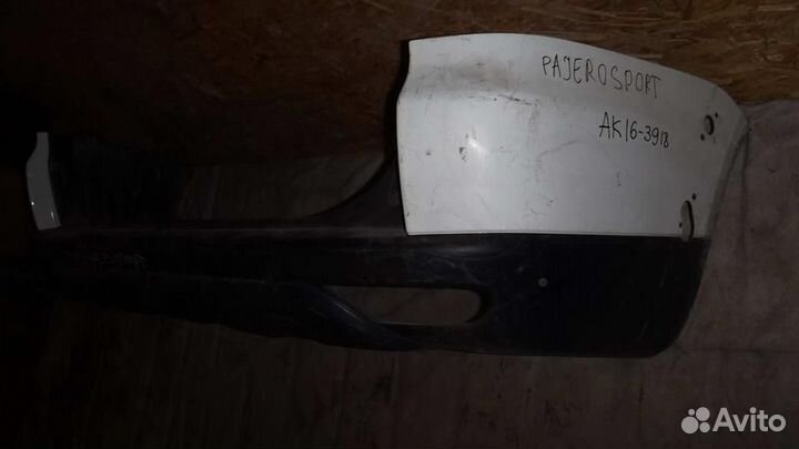 Бампер задний Mitsubishi Pajero Sport II 2009-2015