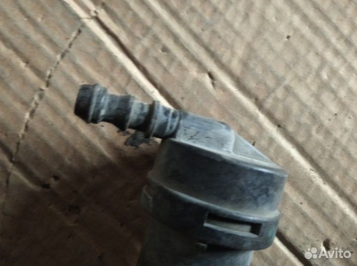 Форсунка омывателя фары передняя левая Nissan