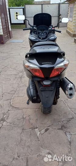 Макси скутер