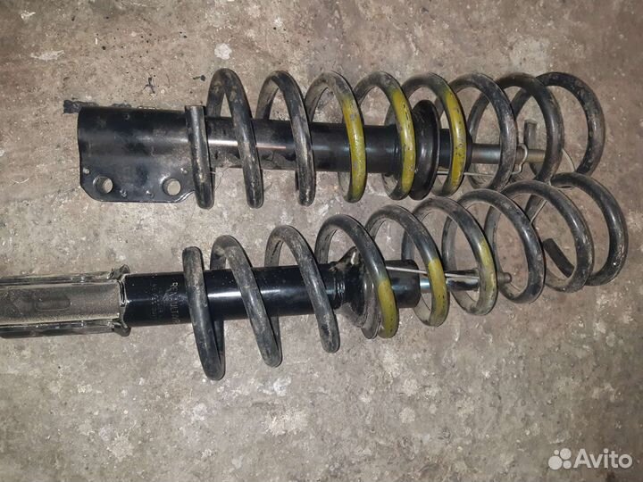 Передние стойки с пружиной на renault megane