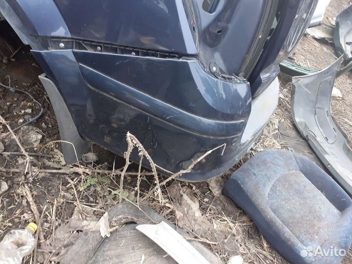 Задний бампер Opel Astra H