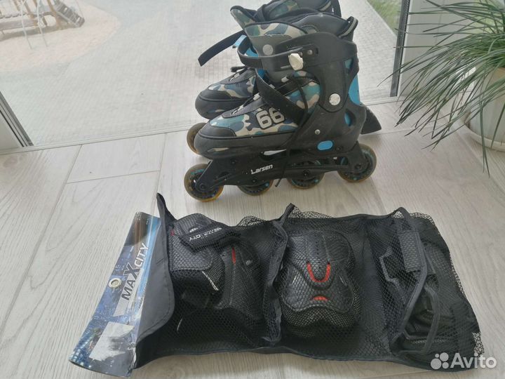 Роликовые коньки