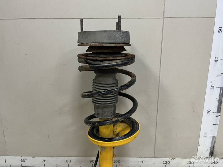 Амортизатор передний левый Suzuki Liana 2001-2007