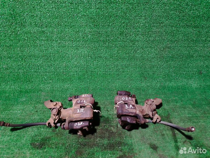 Суппорт тормозной задний левый Mazda 6