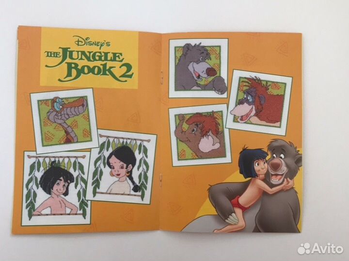 Книга со схемами для вышивки крестом с персонажами