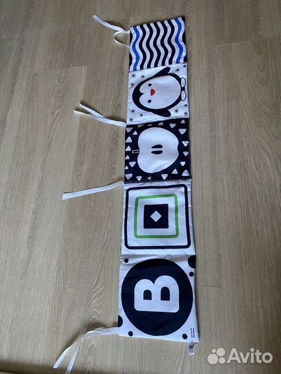 Книжка бортик в кроватку