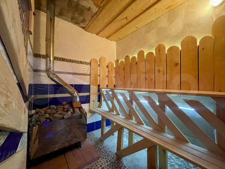 Коттедж 317 м² на участке 6 сот.