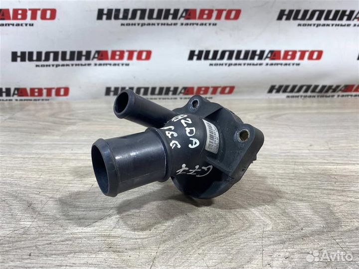 Корпус термостата Мазда 6 GG 2,0