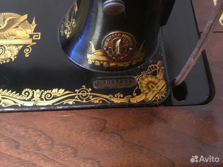 Антикварная швейная машинка Зингер