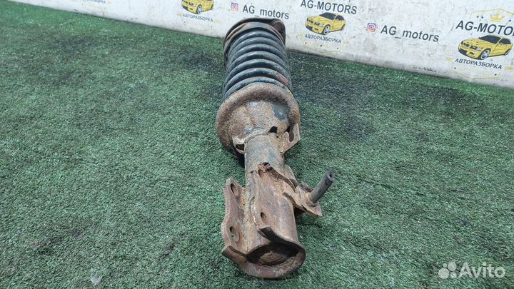 Стойка подвески передняя левая 1.3 Kia Rio 1