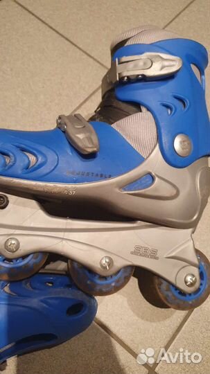 Роликовые коньки