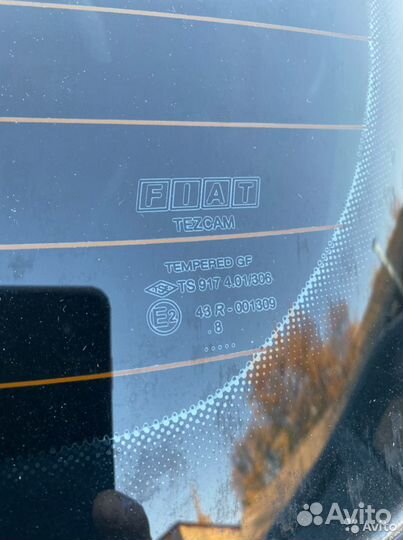 Стекло заднее fiat Albea