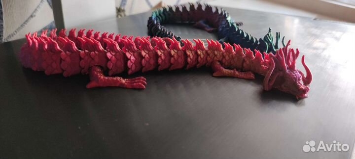 Дракон игрушка антистресс на шарнирах цветной