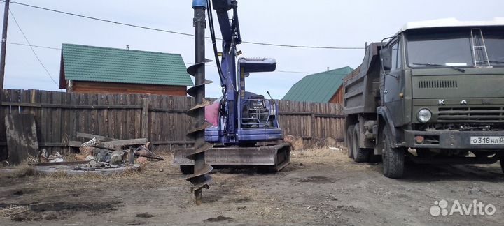 Услуги ямобура бурение Экскаватор