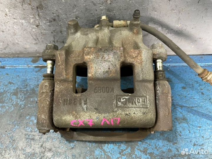 Суппорт передний левый Mazda Cx-7 ER