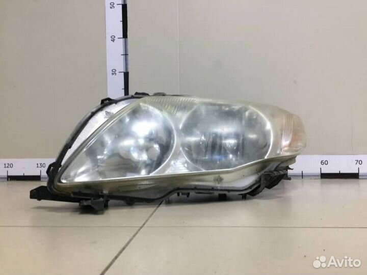 Фара левая Toyota Corolla E150 2006-2013