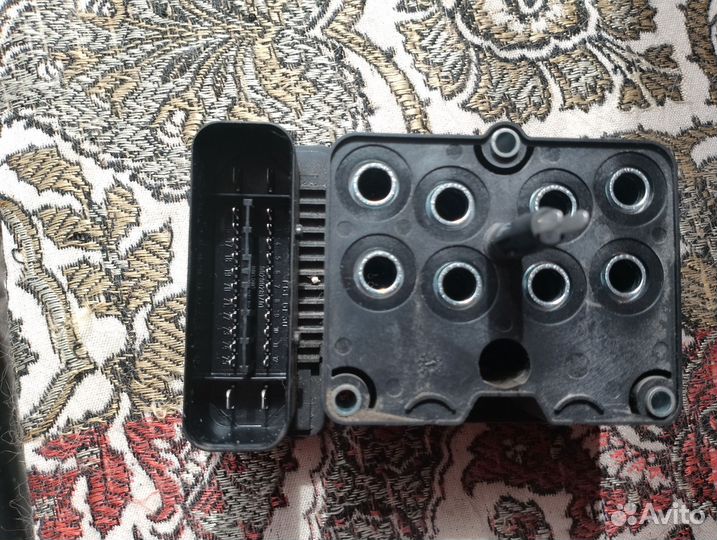 Блок абс mazda 3