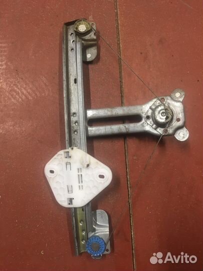 Стеклоподъёмник задний левый Рено Логан 1