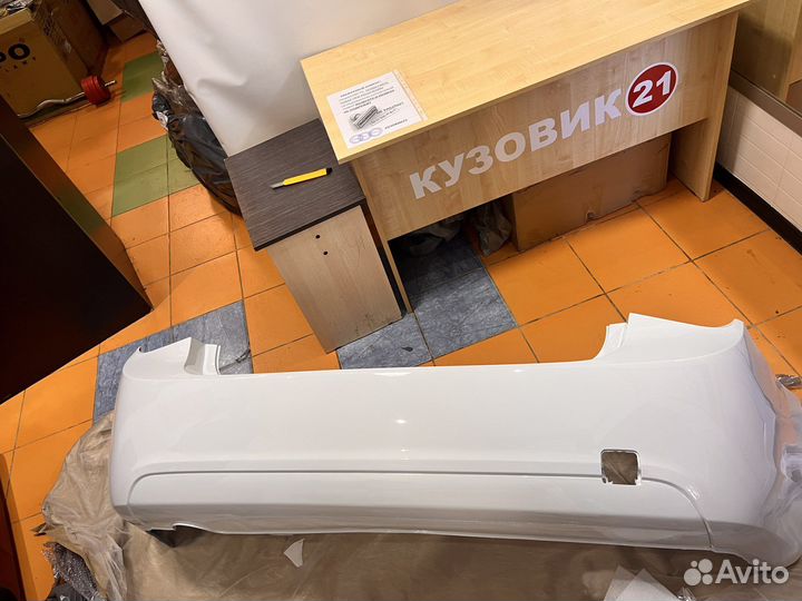 Задний бампер Chevrolet Cruze белый