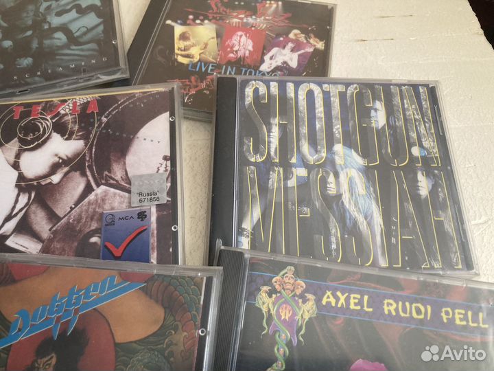 Компакт диски фирма(Tesla-Spread Eagle-Dokken)