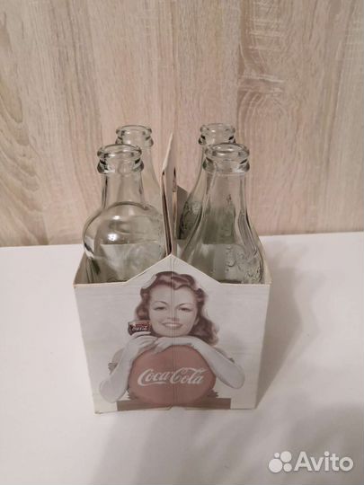 Бутылки Coca cola