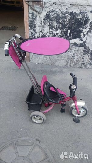 Трёхколёсный велосипед с ручкой