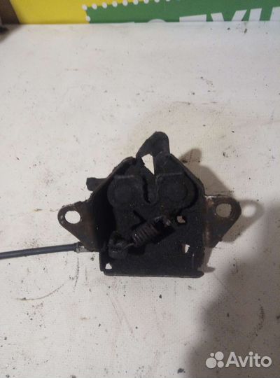 Замок капота mazda protege