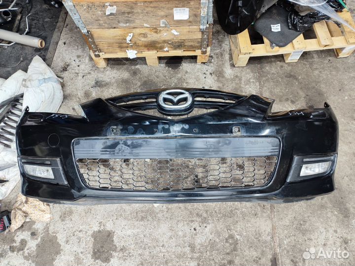 Бампер Мазда 3 бк седан