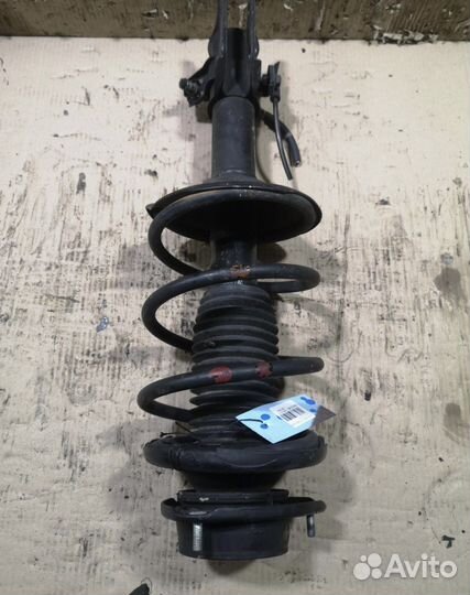 Стойка амортизатора передняя Subaru Impreza gc8