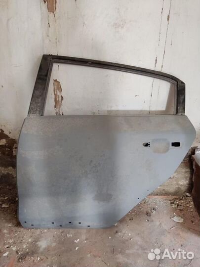 Задняя левая дверь от Kia RioX