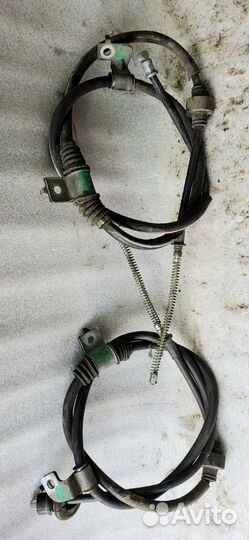 Трос стояночного тормоза Mitsubishi Lancer 10