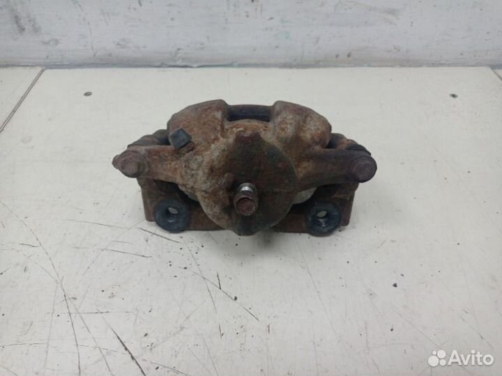 Суппорт тормозной передний левый Honda Cr-V RE 2.0