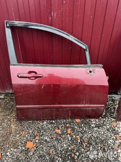 Suzuki liana двери