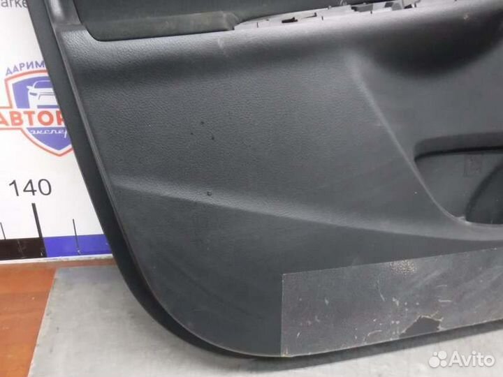 Обшивка двери передняя левая Toyota Corolla 151