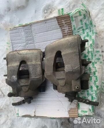 Передние суппорта с колодками (компл) VAG