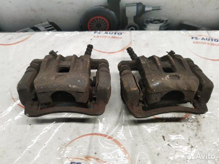 Суппорт тормозной задний Ssangyong Action New 2.0