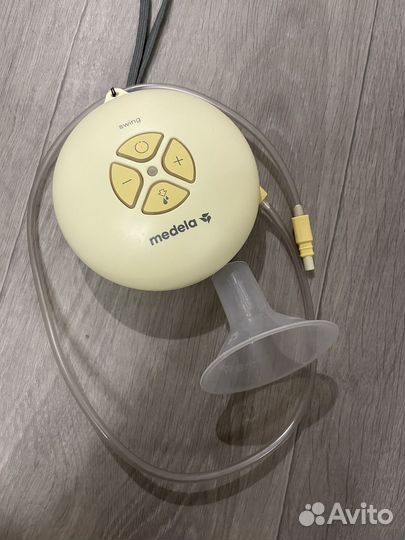 Молокоотсос medela электрический