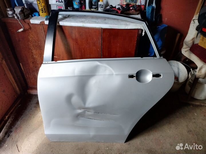 Ниссан Альмера g 15. Левая задняя дверь