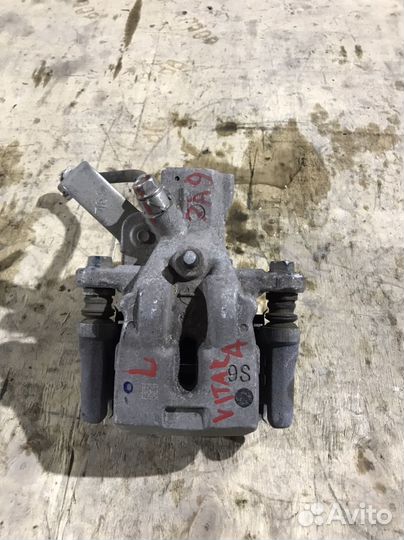 Суппорт задний левый Suzuki Vitara SX4 Оригинал