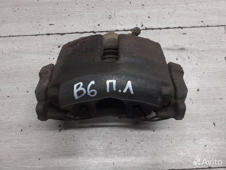 Суппорт передний левый VAG