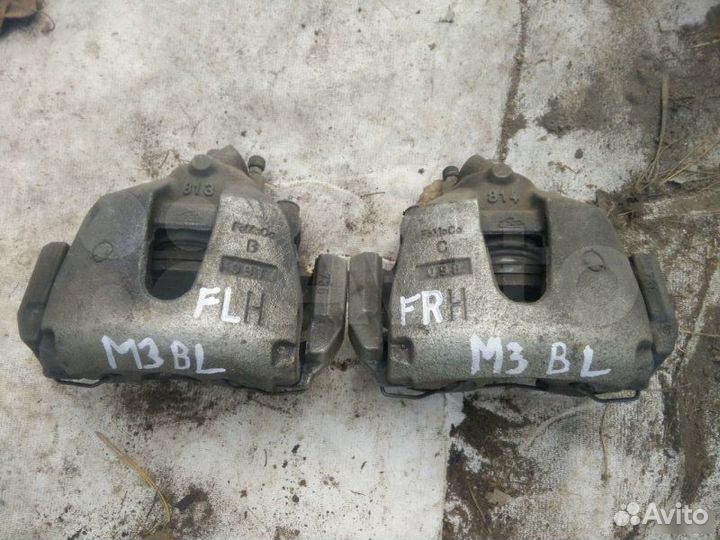 Суппорт тормозной передний Mazda 3 BK