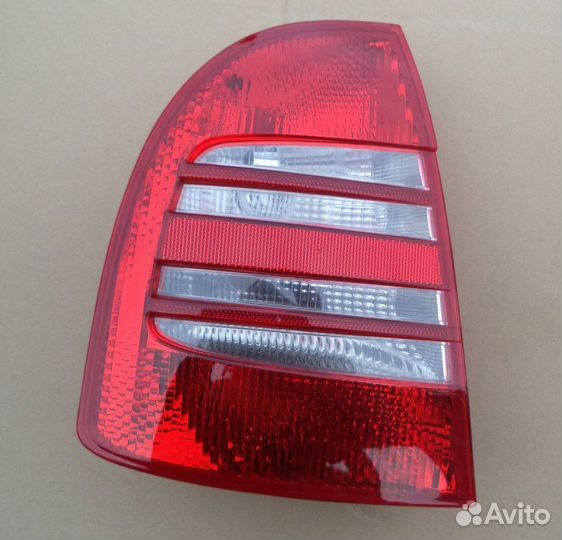 Фонарь задний левый задний левый Skoda Superb