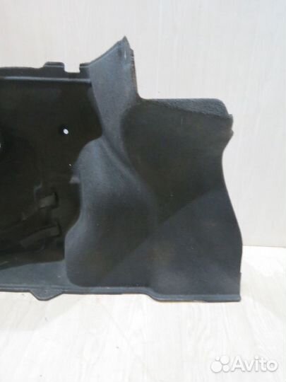 Обшивка багажника левая Kia Rio 3