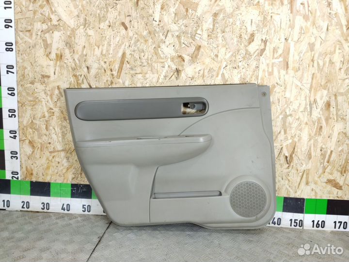 Обшивка двери передней левой Mazda Carol 2004-2009