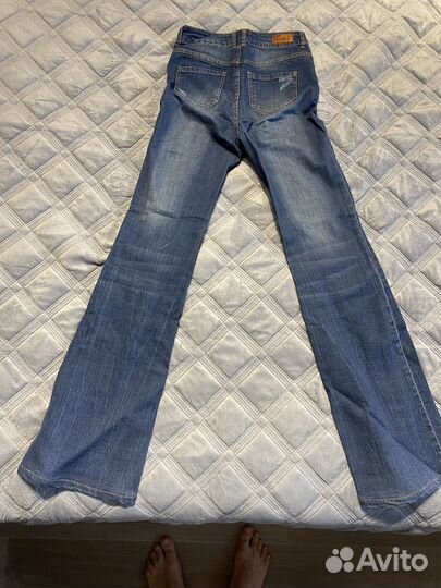 Джинсы клеш женские