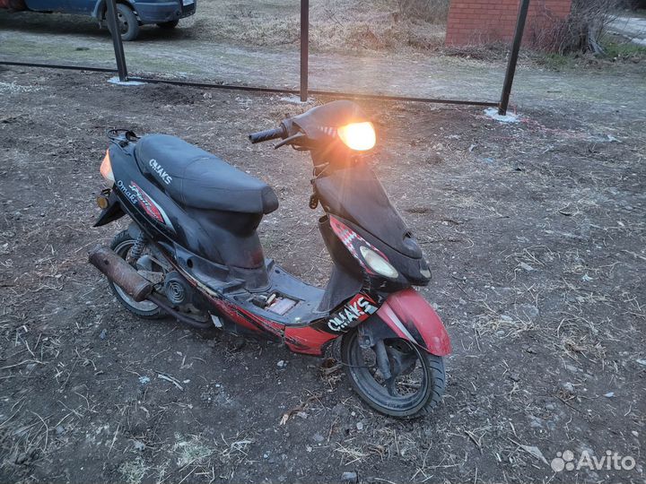 Скутер Omaks