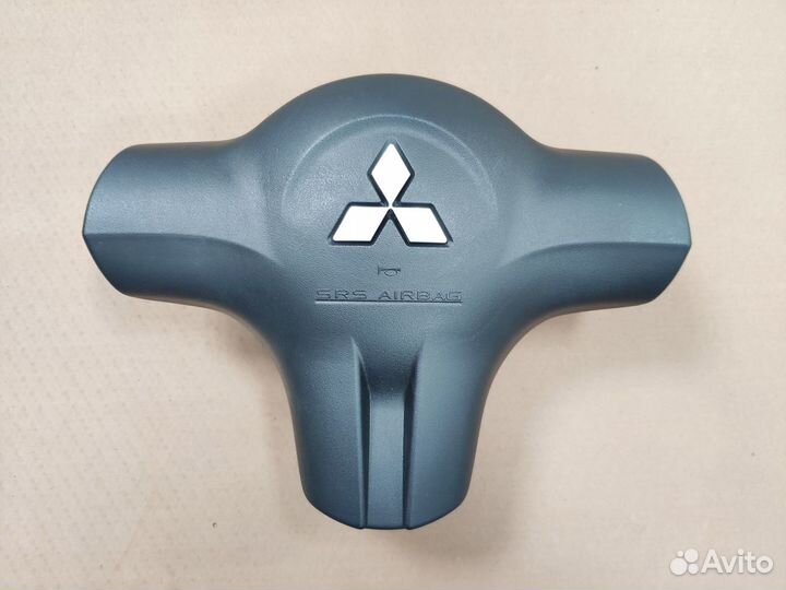 Заглушка в руль Mitsubishi Lancer 9